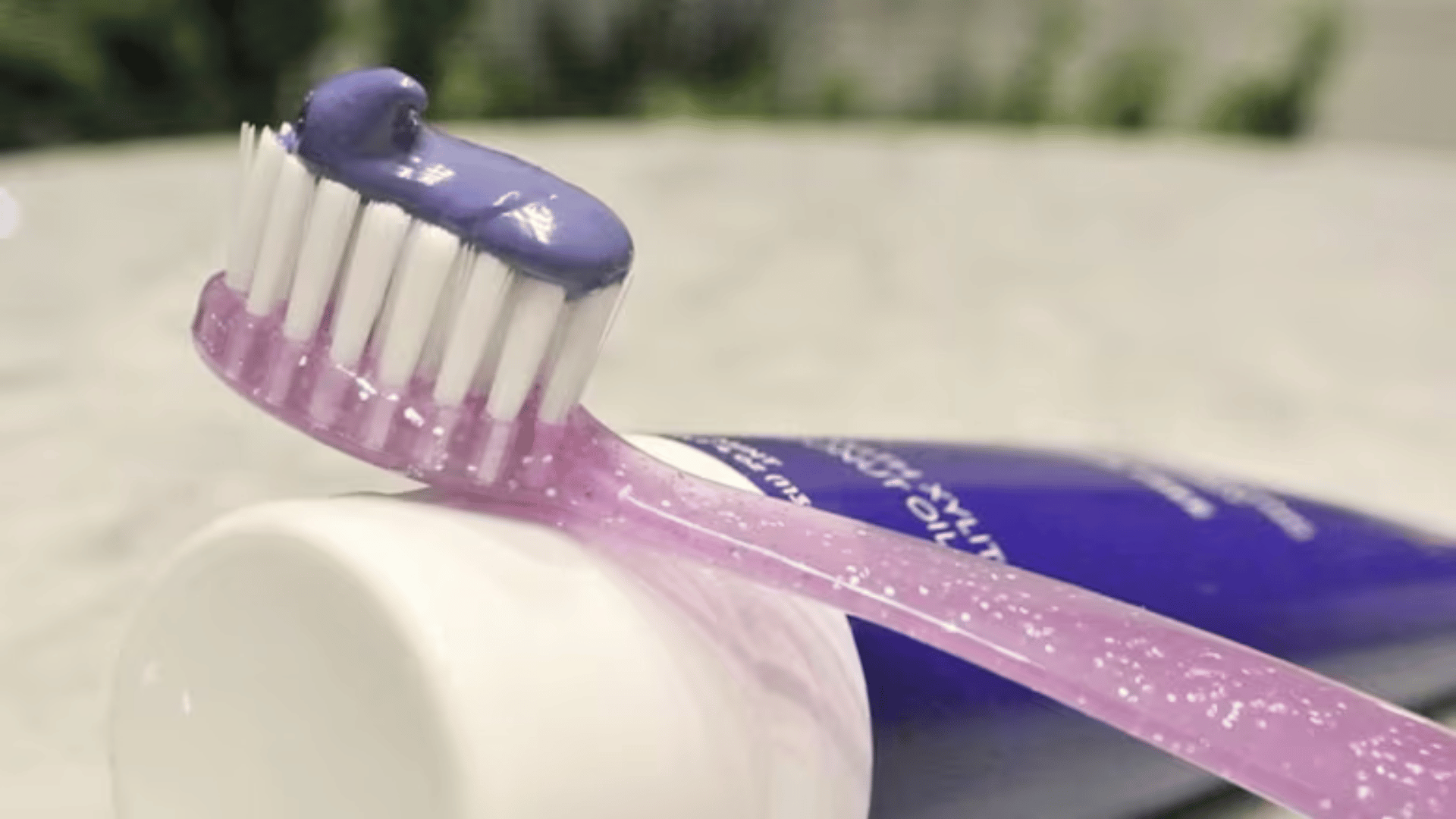 Purple toothpaste helps with teeth whitening; Photo: Instagram, @popwhitesmile